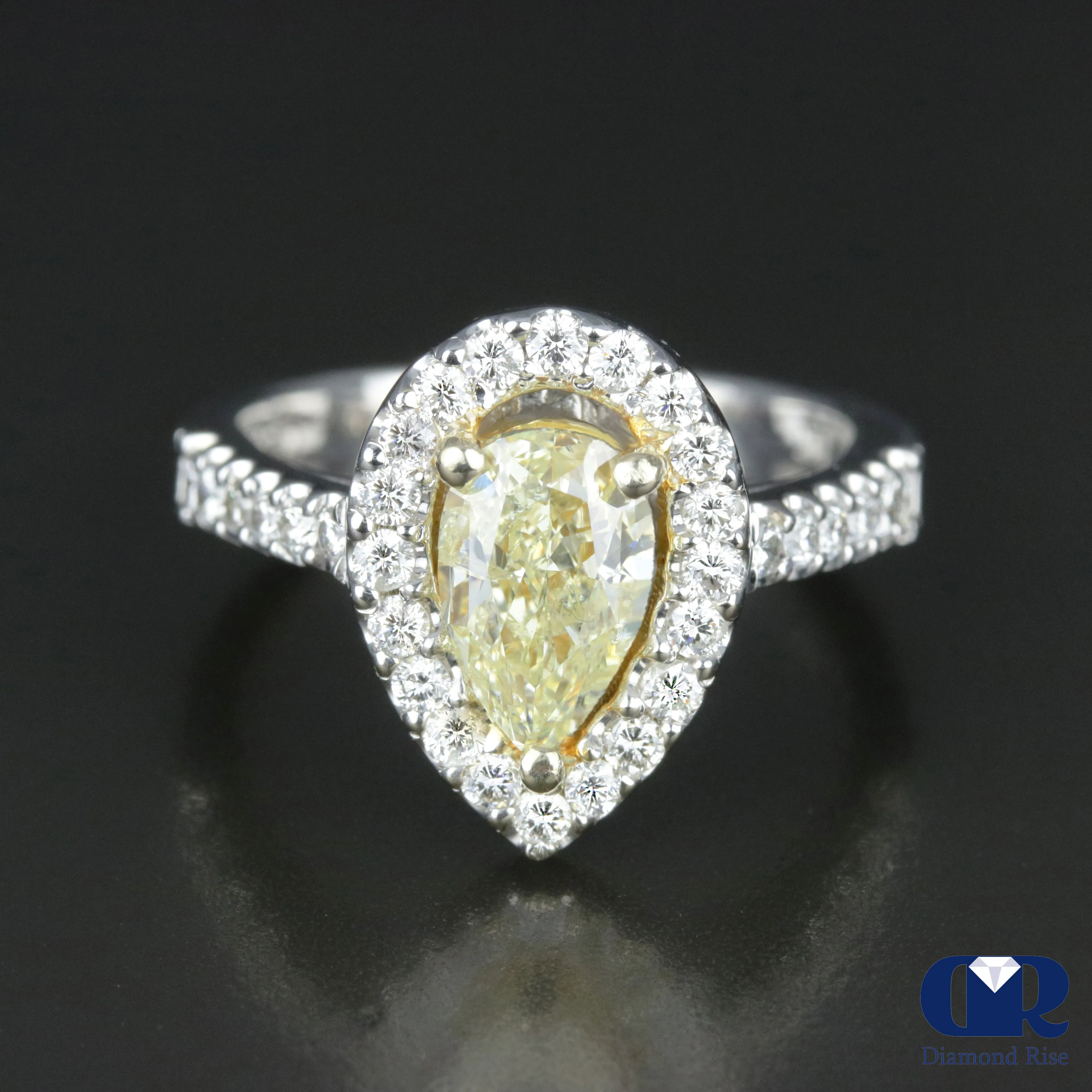 2.23 Carat Pear Cut Fancy Yellow Diamond Halo Engagement Ring In 14K White Gold